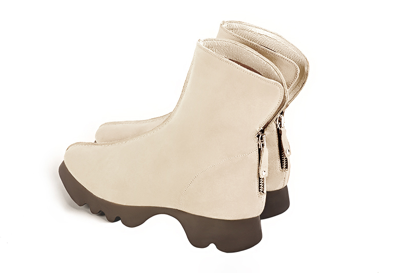 Champagne beige women's ankle boots with a zip at the back.. Rear view - Florence KOOIJMAN